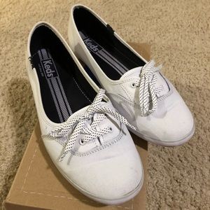 White slip on Keds